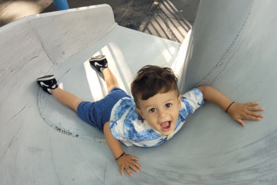 little boy on slide